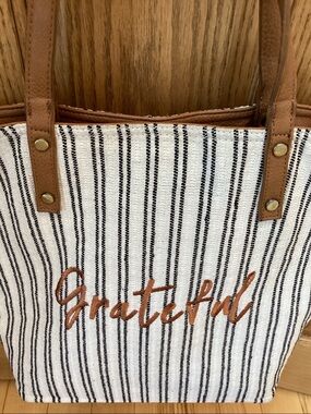 “Grateful” blue and white striped tote bag with tan straps